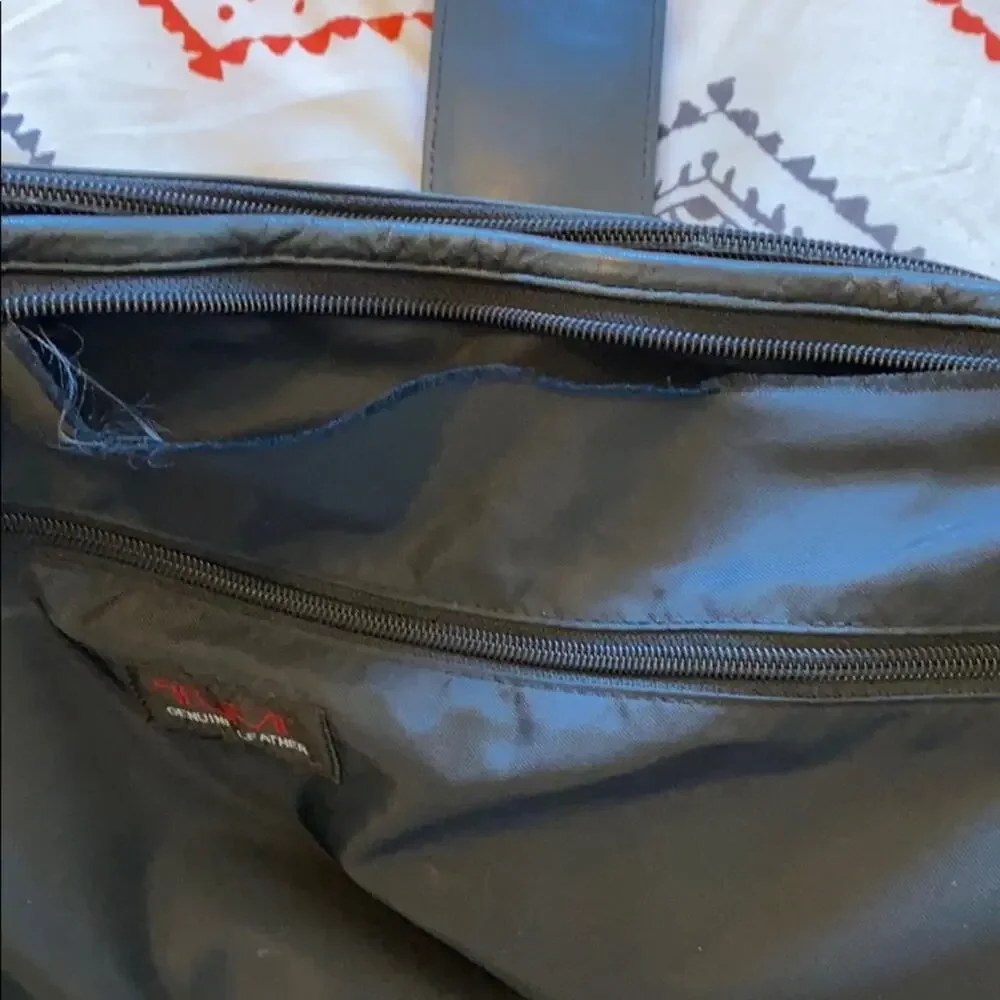 TUMI distressed leather messenger computer bag broken in rugged manly minimalist